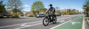 Rider on an electric bike in a US city bike lane